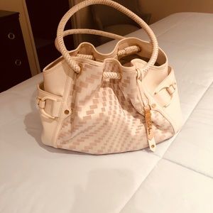 Cole Haan offwhite  with gold trim tote bag.